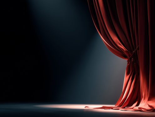 Image de couverture représentant un rideau ouvert sur une scène de théâtre. Représente le moment de la révélation.